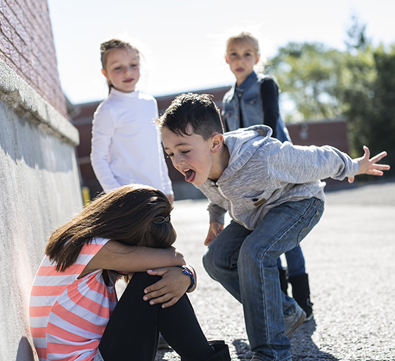 High school students address bullying with younger students through anti- bullying program